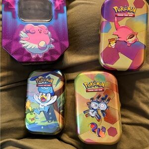 Pokemon Trading Card Tins - Purple, Blue, Yellow, Pink